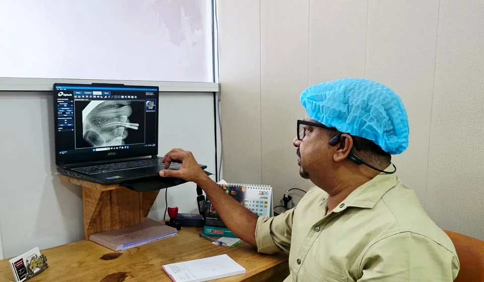 Doctor reviewing diagnostic records for aligner planning
